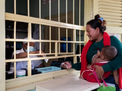 Women buying medicines in a pharmacy